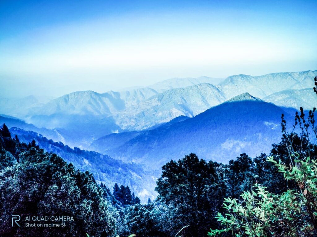snow view Himalayas Nainital travel guide